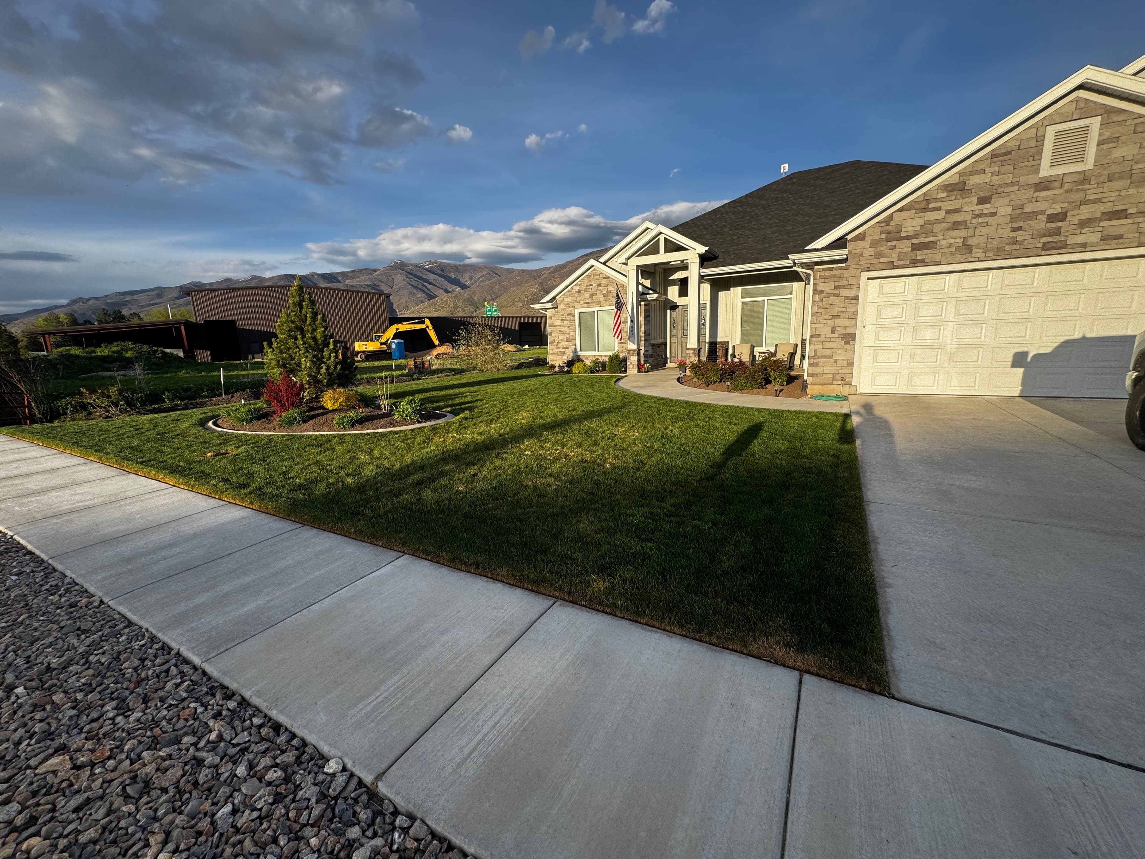 Project Sharp Garden Bed Edges and Fresh Mulch on This Front Yard image